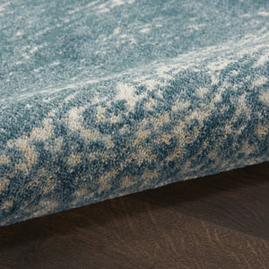 HomeRoots 5' Teal and Ivory Abstract Area Rug – Stain-Resistant, Non-Skid, Durable Design for Modern Spaces 9' X 13' 551509