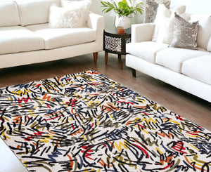 HomeRoots 9' X 13' White Abstract Non-Skid Area Rug - Modern Design for Living Rooms, Dining Spaces & More! 551713