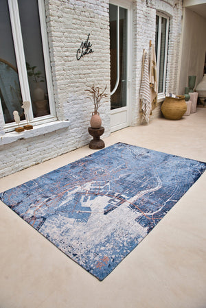 HomeRoots 8' Blue and Black Round Abstract Area Rug - Modern Non-Skid Design for Living Room & Dining Spaces 551757
