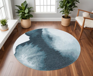 HomeRoots 8' Blue and Gray Round Abstract Area Rug - Stylish Non-Skid Design for Modern Living Spaces 551817