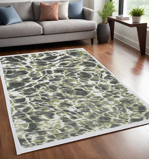 Homeroots 5' X 7' Green And White Abstract Non Skid Area Rug  100% Pet 551923