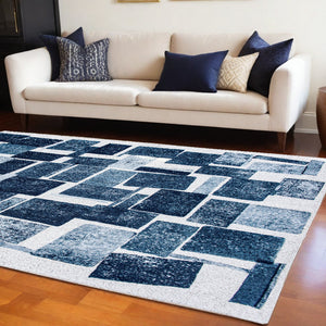 Homeroots 7' X 9' Blue And White Geometric Non Skid Area Rug  100% Pet 551933