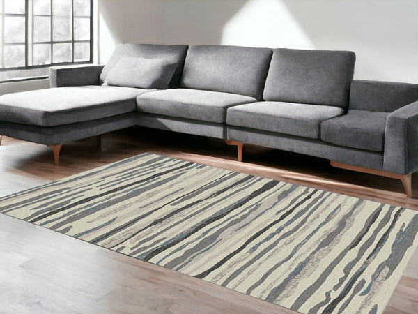 HomeRoots 5' Modern Beige and Gray Abstract Area Rug - Soft, Durable Design for Stylish Homes with Kids & Pets 5' X 8' 552162