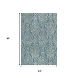 Homeroots 5' X 8' Blue And Beige Damask Distressed Area Rug Blue Polypropylene 552166