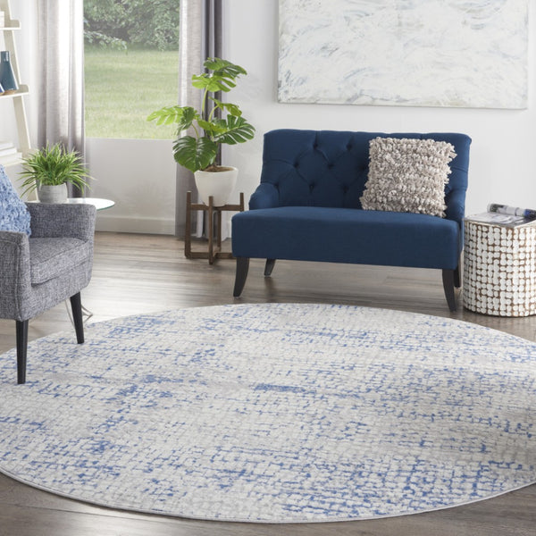 HomeRoots 8' Abstract Geometric Pattern Rug in Ivory, Blue, and Gray - Durable, Stain-Resistant for Modern Spaces 8' Round 552300