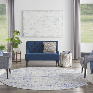HomeRoots 8' Abstract Geometric Pattern Rug in Ivory, Blue, and Gray - Durable, Stain-Resistant for Modern Spaces 8' Round 552300