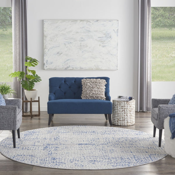 HomeRoots 8' Abstract Geometric Pattern Rug in Ivory, Blue, and Gray - Durable, Stain-Resistant for Modern Spaces 8' Round 552300