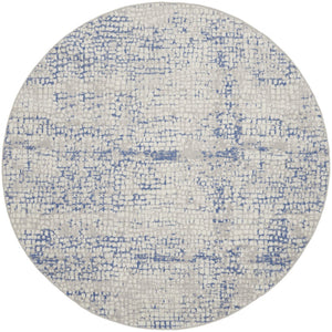HomeRoots 8' Abstract Geometric Pattern Rug in Ivory, Blue, and Gray - Durable, Stain-Resistant for Modern Spaces 8' Round 552300