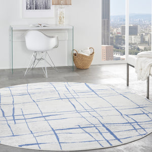 HomeRoots 8' Abstract Distressed Ivory and Blue Rug - Modern Geometric Design for Stylish, Family-Friendly Spaces 8' Round 552301