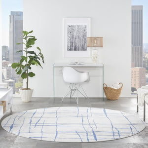 HomeRoots 8' Abstract Distressed Ivory and Blue Rug - Modern Geometric Design for Stylish, Family-Friendly Spaces 8' Round 552301