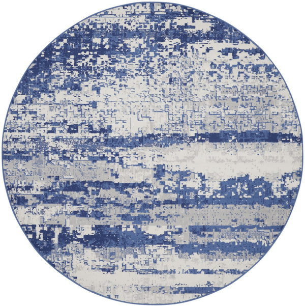Homeroots 8' Ivory And Navy Blue Abstract Round Rug  Polypropylene 552308