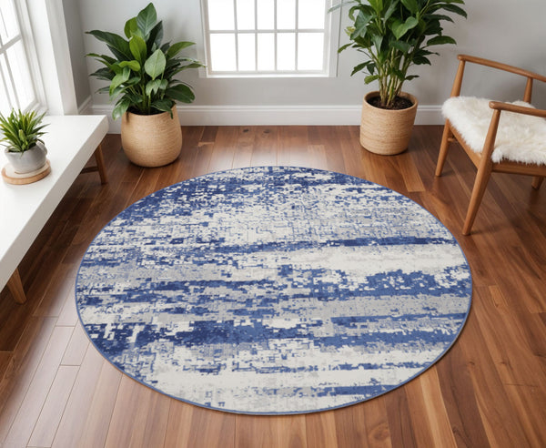 Homeroots 8' Ivory And Navy Blue Abstract Round Rug  Polypropylene 552308