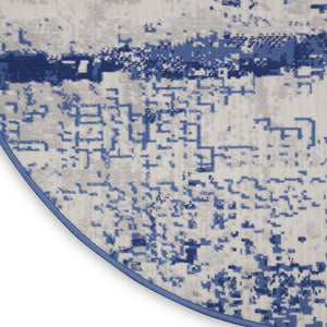 HomeRoots 8' Ivory and Navy Blue Abstract Area Rug - Modern Durable Design for Family-Friendly Spaces 8' Round 552308
