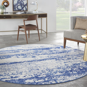 HomeRoots 8' Ivory and Navy Blue Abstract Area Rug - Modern Durable Design for Family-Friendly Spaces 8' Round 552308