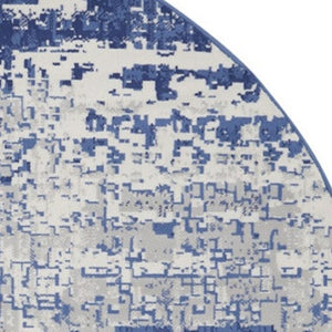HomeRoots 8' Ivory and Navy Blue Abstract Area Rug - Modern Durable Design for Family-Friendly Spaces 8' Round 552308