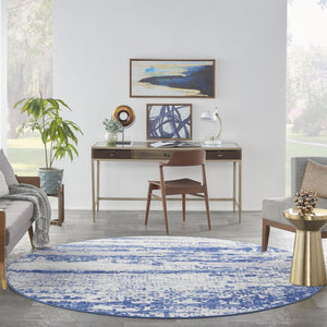 HomeRoots 8' Ivory and Navy Blue Abstract Area Rug - Modern Durable Design for Family-Friendly Spaces 8' Round 552308