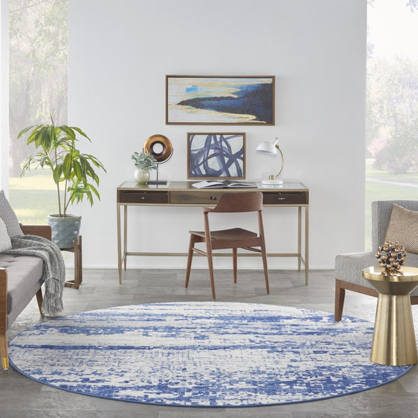 HomeRoots 8' Ivory and Navy Blue Abstract Area Rug - Modern Durable Design for Family-Friendly Spaces 8' Round 552308