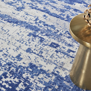 Homeroots 8' Ivory And Navy Blue Abstract Round Rug  Polypropylene 552308