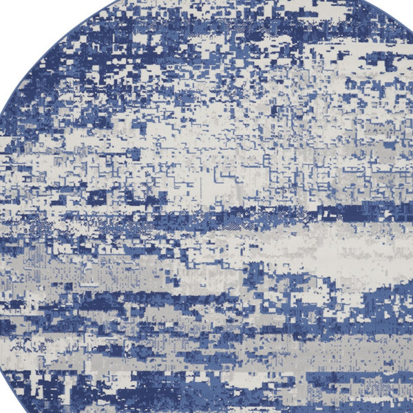 Homeroots 8' Ivory And Navy Blue Abstract Round Rug  Polypropylene 552308