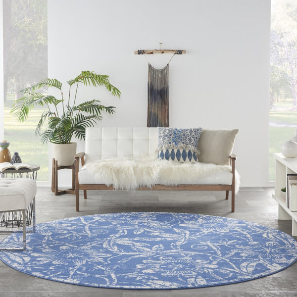 HomeRoots 8' Ivory and Blue Floral Rug - Timeless Distressed Design for Cozy Living Spaces and Easy Care 8' Round 552316