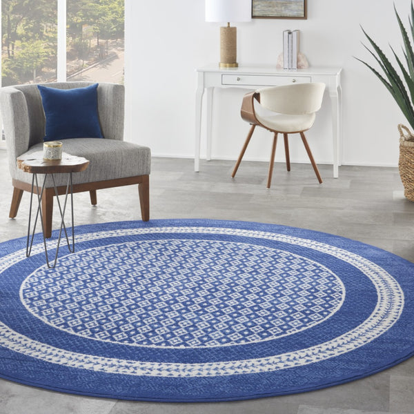 HomeRoots 7' Ivory and Navy Blue Geometric Distressed Area Rug - Durable, Non-Skid Design for High-Traffic Spaces 8' Round 552326