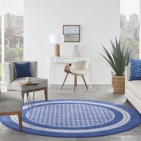 HomeRoots 7' Ivory and Navy Blue Geometric Distressed Area Rug - Durable, Non-Skid Design for High-Traffic Spaces 8' Round 552326