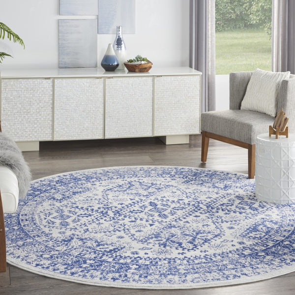 HomeRoots 8' Ivory and Navy Blue Geometric Distressed Rug - Durable, Stylish, Low-Maintenance for Modern Homes 8' Round 552327