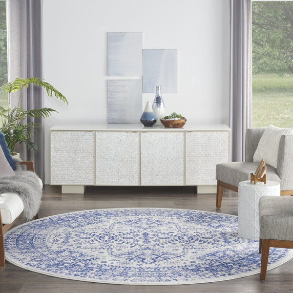 HomeRoots 8' Ivory and Navy Blue Geometric Distressed Rug - Durable, Stylish, Low-Maintenance for Modern Homes 8' Round 552327