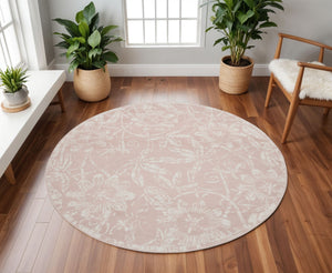 Homeroots 8' Pink And Ivory Floral Distressed Round Rug  Polypropylene 552337