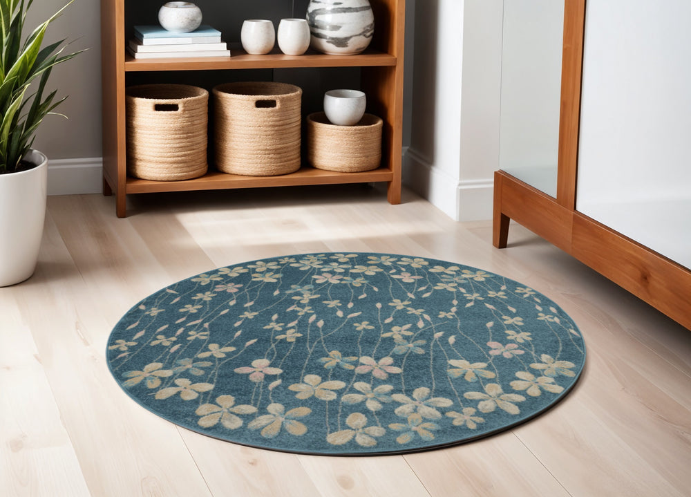 Homeroots 5' Turquoise And Cream Botanical Leaves Round Rug – Durable, Stain Resistant, Stylish Home Accent!  Polypropylene 552381