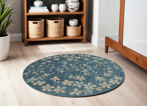 Homeroots 5' Turquoise And Cream Botanical Leaves Round Rug – Durable, Stain Resistant, Stylish Home Accent!  Polypropylene 552381