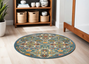 Homeroots 5' Teal And Ivory Round Floral Power Loom Area Rug  Polypropylene 552389