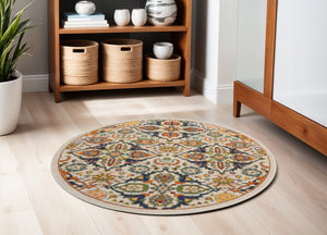 Homeroots 5' Ivory And Blue Round Floral Power Loom Area Rug  Polypropylene 552395