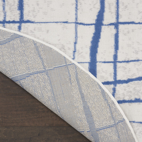 Homeroots 5' Ivory And Blue Abstract Geometric Distressed Round Rug  Polypropylene 552403