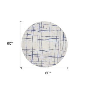 Homeroots 5' Ivory And Blue Abstract Geometric Distressed Round Rug  Polypropylene 552403