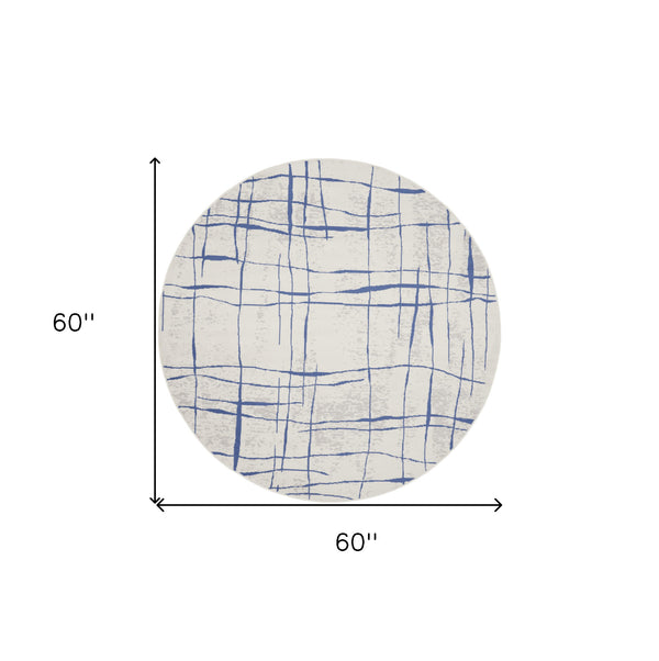 Homeroots 5' Ivory And Blue Abstract Geometric Distressed Round Rug  Polypropylene 552403