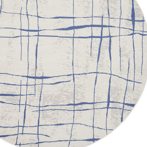 Homeroots 5' Ivory And Blue Abstract Geometric Distressed Round Rug  Polypropylene 552403