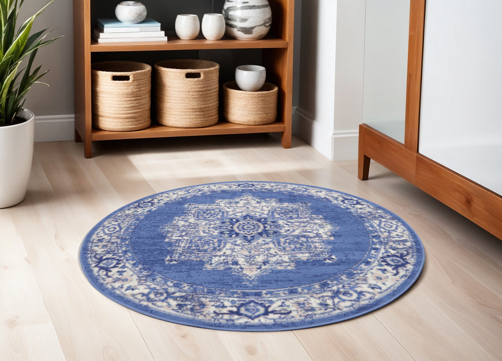 Homeroots 5' Ivory Navy Blue And Beige Floral Medallion Round Rug  Polypropylene 552415