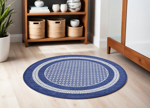 Homeroots 5' Ivory And Navy Blue Geometric Distressed Round Rug  Polypropylene 552423