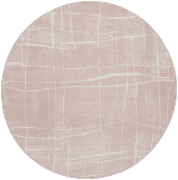 Homeroots 5' Pink And Ivory Abstract Geometric Round Rug  Polypropylene 552432