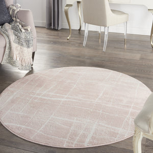 Homeroots 5' Pink And Ivory Abstract Geometric Round Rug  Polypropylene 552432