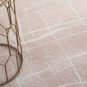 Homeroots 5' Pink And Ivory Abstract Geometric Round Rug  Polypropylene 552432