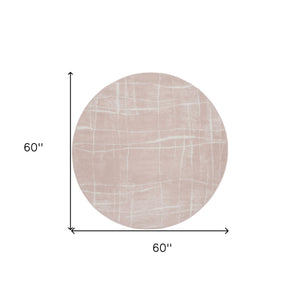 Homeroots 5' Pink And Ivory Abstract Geometric Round Rug  Polypropylene 552432