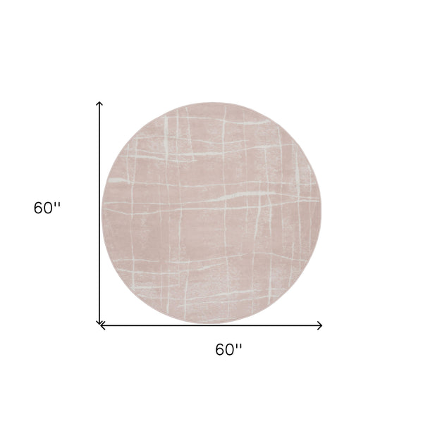 Homeroots 5' Pink And Ivory Abstract Geometric Round Rug  Polypropylene 552432