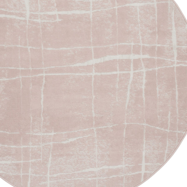 Homeroots 5' Pink And Ivory Abstract Geometric Round Rug  Polypropylene 552432