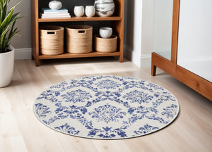 Homeroots 5' Ivory And Navy Blue Damask Distressed Round Rug  Polypropylene 552435