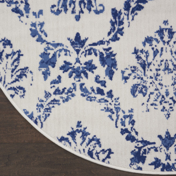 Homeroots 5' Ivory And Navy Blue Damask Distressed Round Rug  Polypropylene 552435
