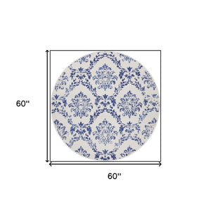 Homeroots 5' Ivory And Navy Blue Damask Distressed Round Rug  Polypropylene 552435