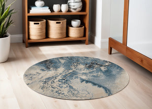 Homeroots 4' Ivory Teal Blue And Black Abstract Round Rug  Polyester 552464