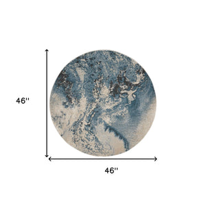 Homeroots 4' Ivory Teal Blue And Black Abstract Round Rug  Polyester 552464